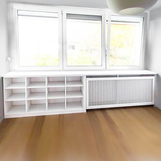Tischlerei nipa Hamburg | weiße Heizkörperverkleidung mit integriertem Regal für Stauraum unter dem Fenster